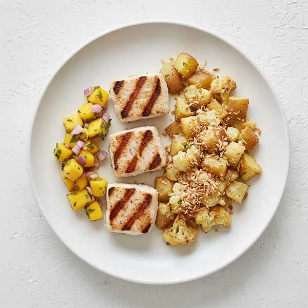 Sazon-Spiced Grilled Fish With Mango-Lime Relish & Toasted Coconut Cauliflower Potato Mix